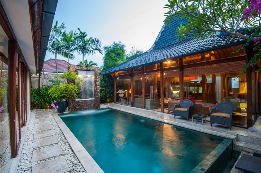 Seminyak private villa Bali with a private pool and living room semi outdoor. 